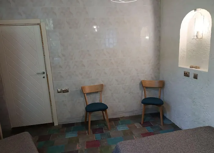 номер в доме у моря с бассейном Odessza